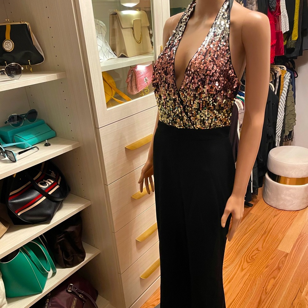 Sequin halter romper. Never worn. No tag.